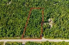 * TERRAIN BOISÉ * 1,76 ACRE * LA PATRIE *