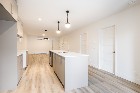 LOGEMENT 5&frac12; NEUF * REZ-DE-JARDIN * EAST ANGUS *